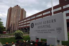 Mount Auburn Hospital sign with hospital in back